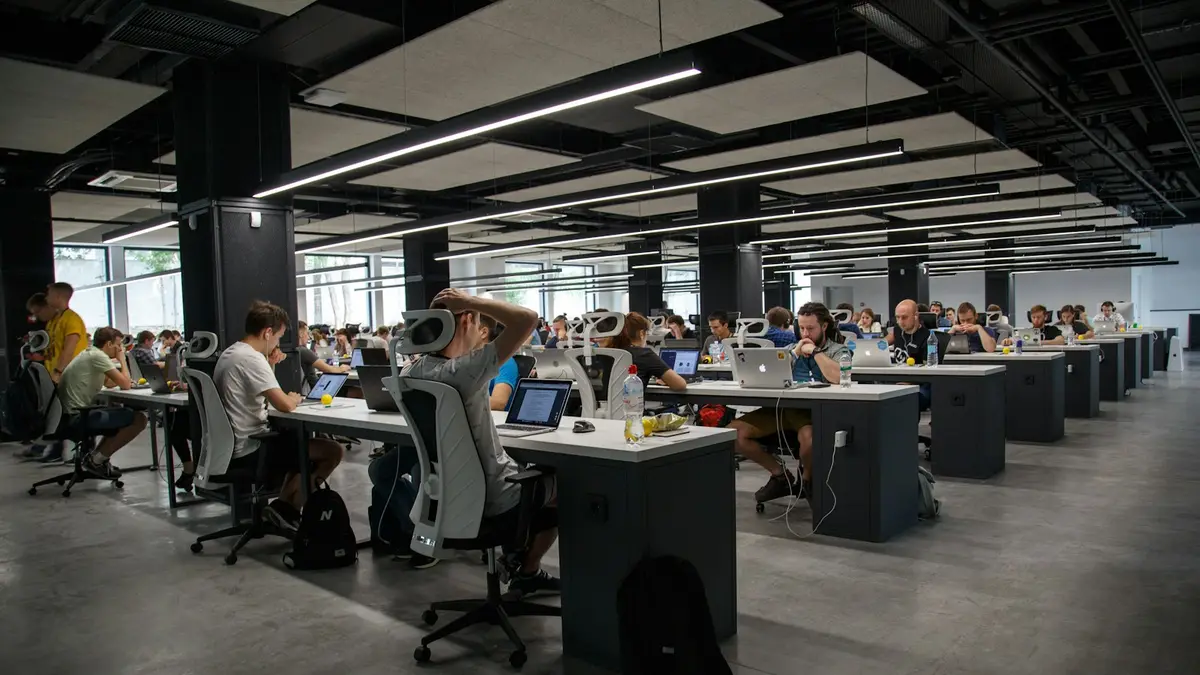Open-plan office with employees working at computers